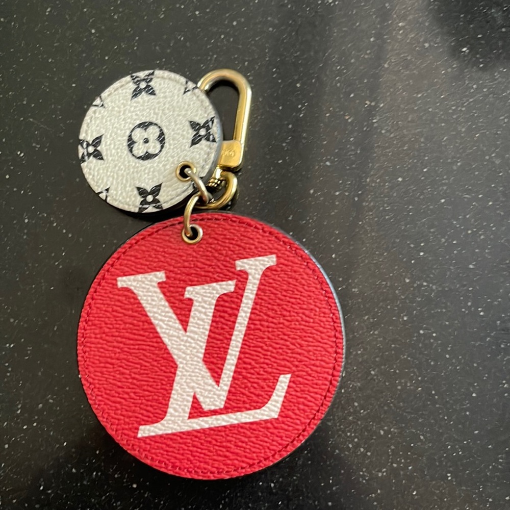 Red/Pink/Black/White LV purse charm or keychain. Approximately 2” wide